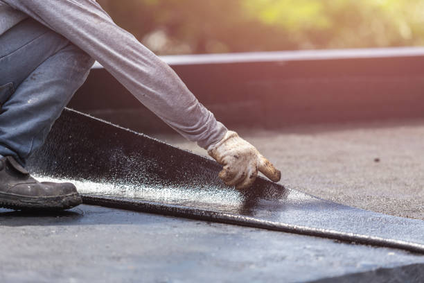 Professional Basement Waterproofing technician working in Bethlehem, KY